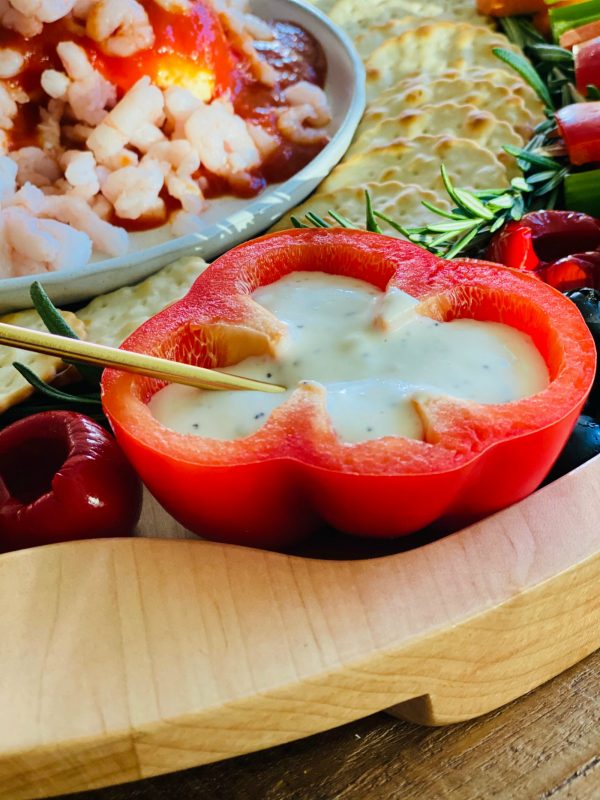 Ranch dressing in a halved red pepper