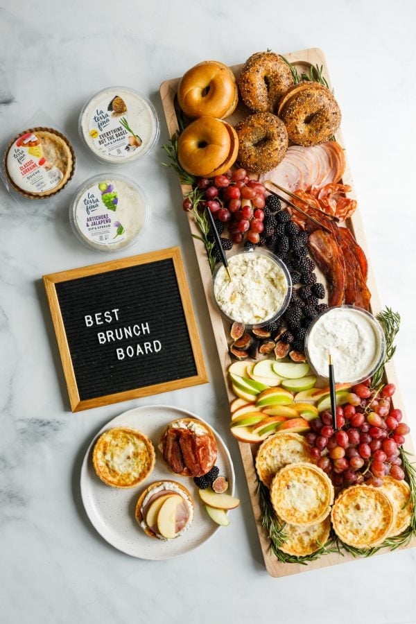 black board "best brunch board" with bagel breakfast spread