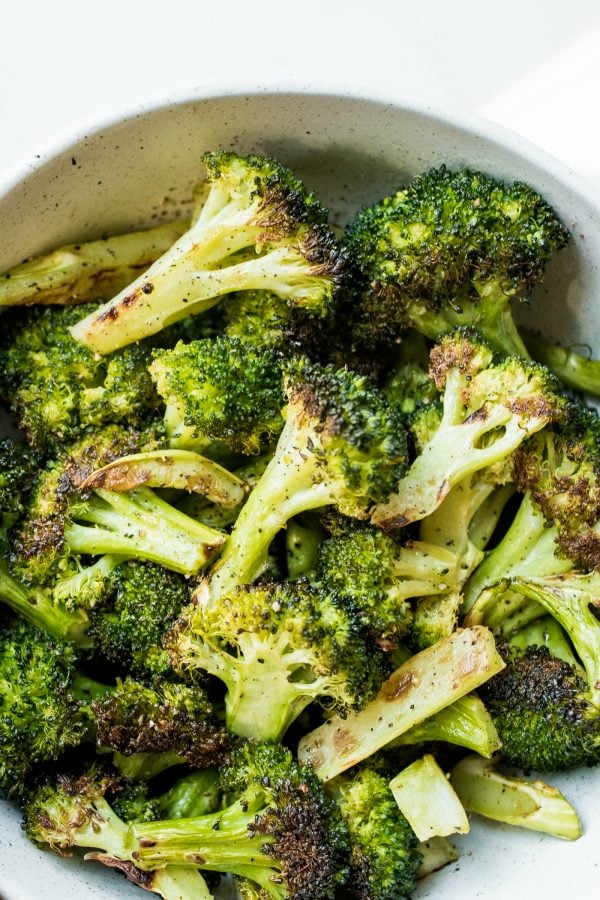 bowl of oven roasted broccoli