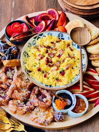 scrambled eggs on breakfast board