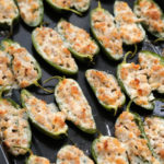 close up Cheesy Baked Jalapeño Poppers with sausage