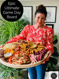 woman holding an Epic Ultimate Game Day Board for a party