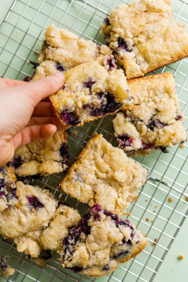 taking a bite of Best Blueberry Kuchen