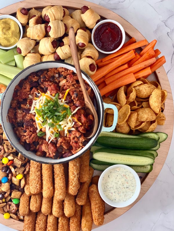 game day board with pot of chili