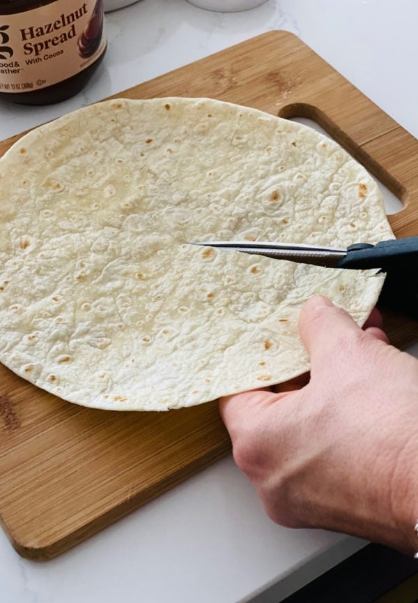 cutting a tortilla for a tortilla hack