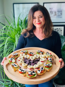 woman holding a Heart Sandwich Board