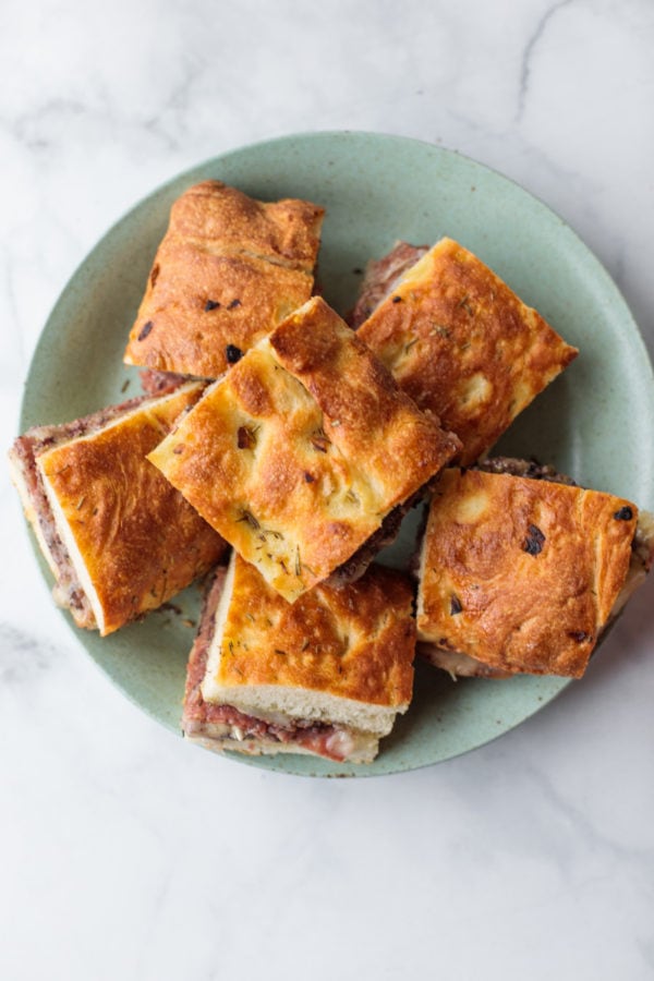 round plate of Cheesy Focaccia Charcuterie Sliders