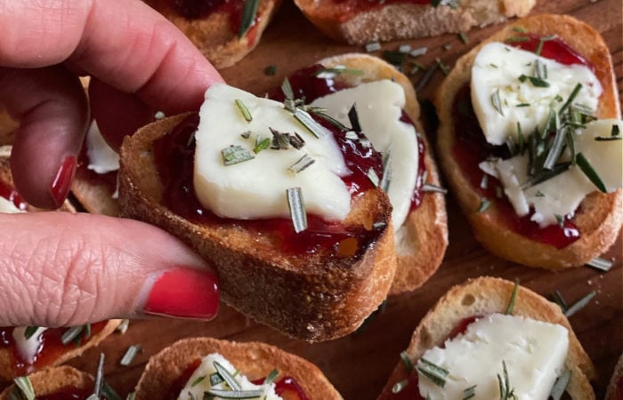 brie with strawberry jam on baguette slice