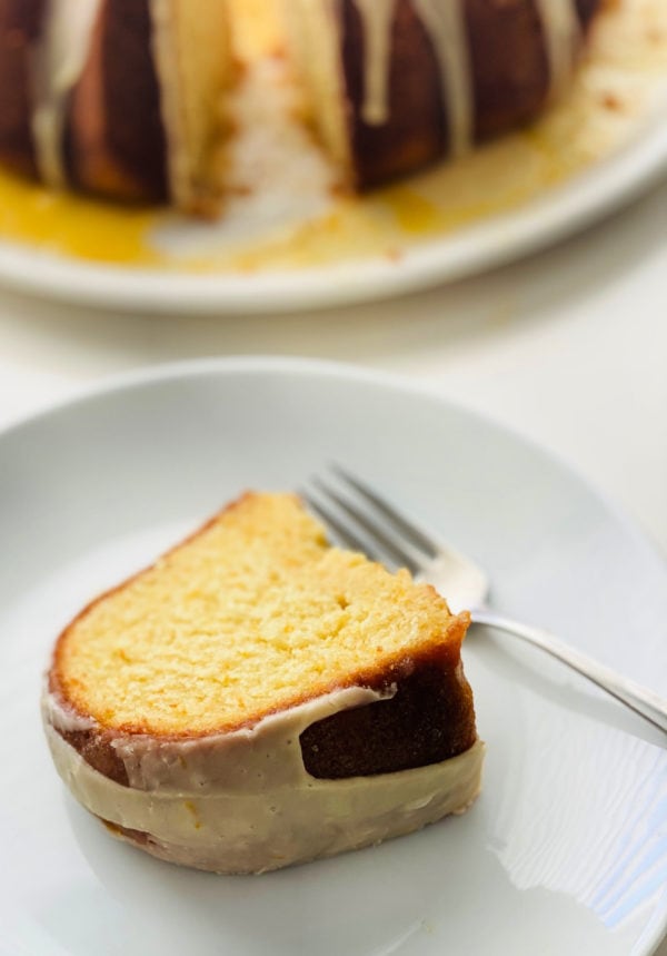 slice of Easy Orange Bundt Cake on white plate