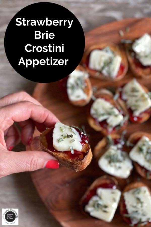 a crostini with strawberries and brie