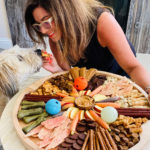 woman and dog with a Dog Charcuterie Board