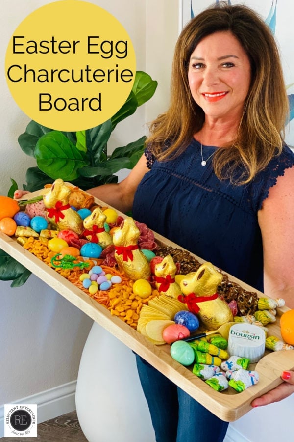 woman holding a Easter Egg Charcuterie Board