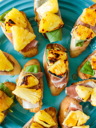 Pineapple Prosciutto Crostini with balsamic drizzle