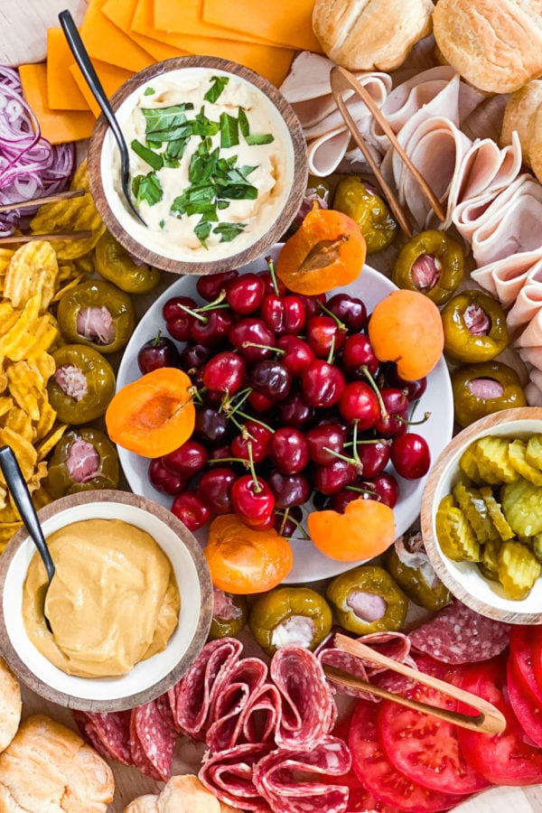 fresh summer cherries and apricots and charcuterie spread