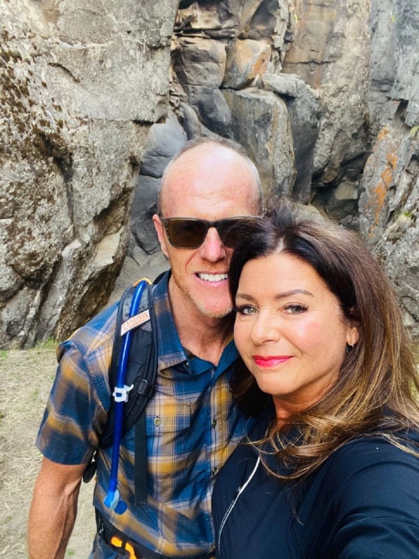 couple in front of crack in ground, OR