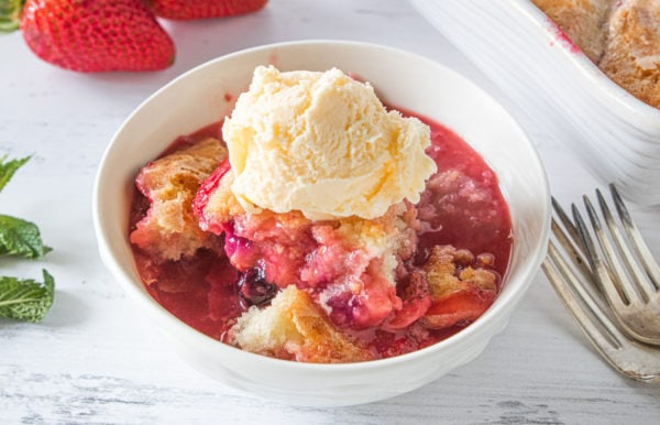 white bowl of Best Strawberry Cobbler Recipe