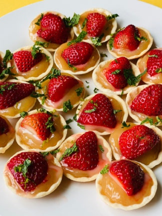 lemon tarts with strawberries and mint