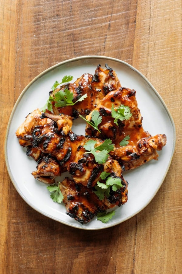 plate of Grilled BBQ Marinated Chicken thighs
