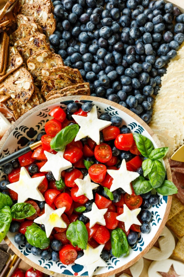 cparese salad with blueberries and white cheese stars
