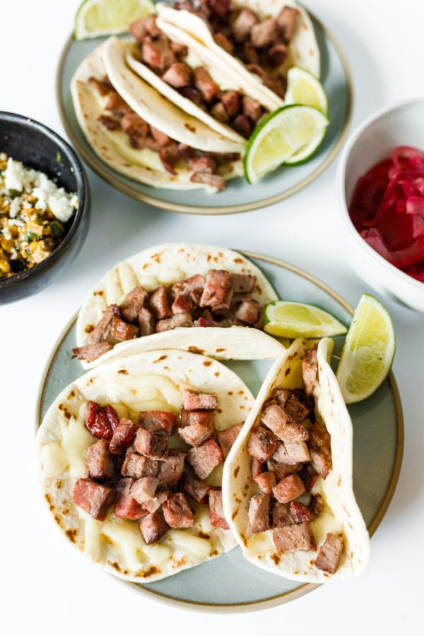 mini steak tacos on a plate