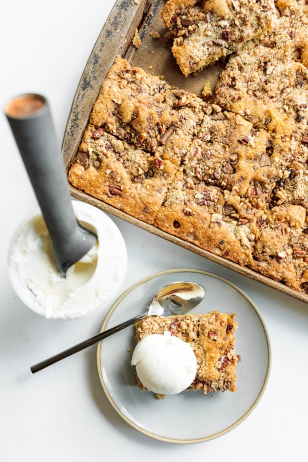 scooping ice cream for a piece of heath brunch cake