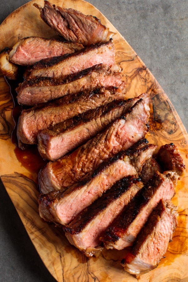 Miso Marinated New York Steak on wood platter