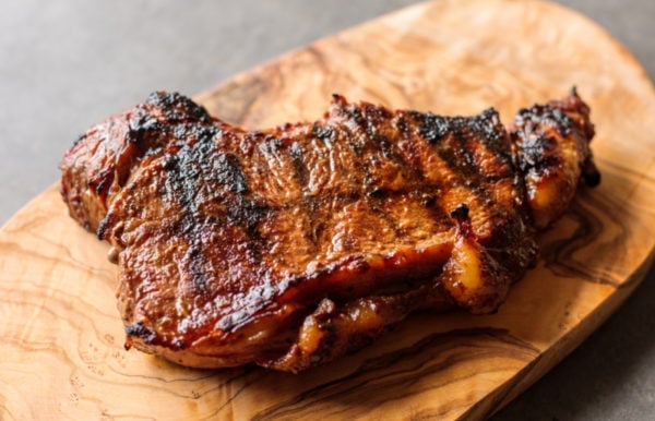 Miso Marinated New York Steak on wood platter