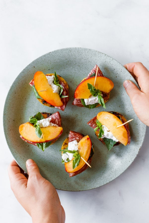 round plate of Polenta Nectarine Feta Bites