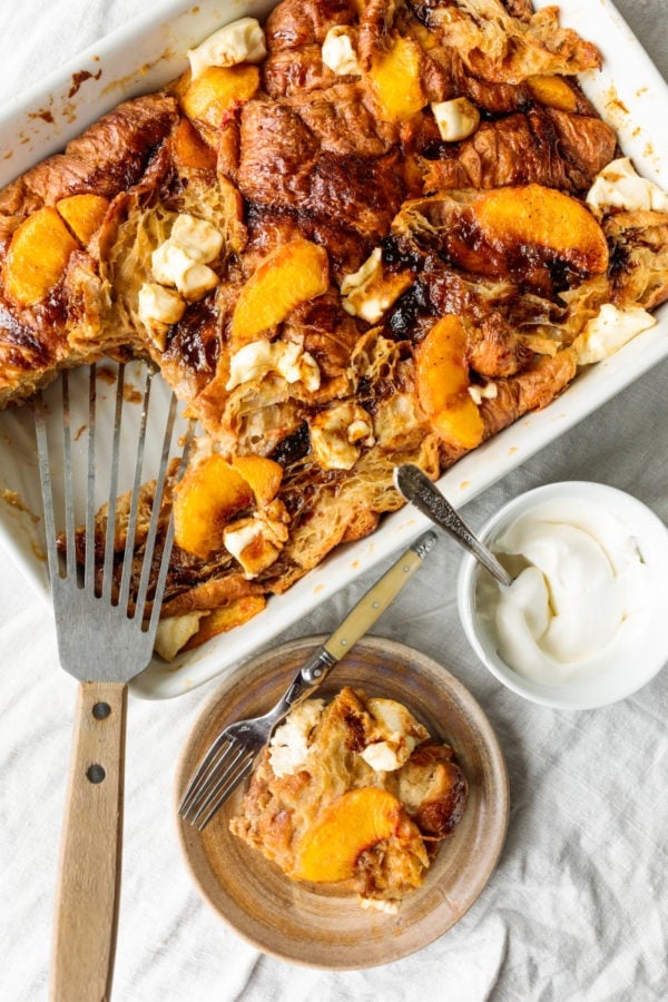 serving of Peaches and Cream Bread Pudding with cream