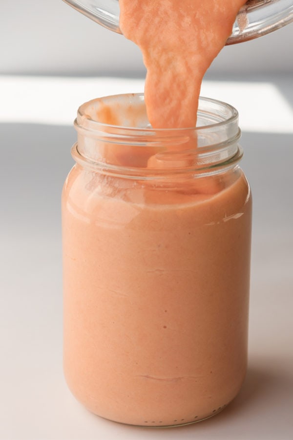 pink rhubarb curd in a canning jar