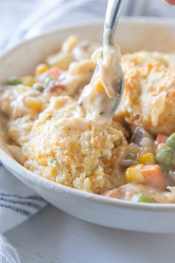 cheesy bite of Chicken Pot Pie with Cheesy Drop Biscuits