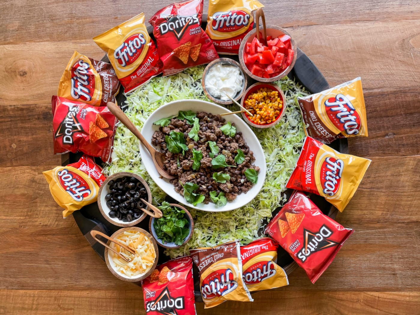 https://reluctantentertainer.com/wp-content/uploads/2021/08/Epic-Walking-Taco-Board-fritos.jpeg