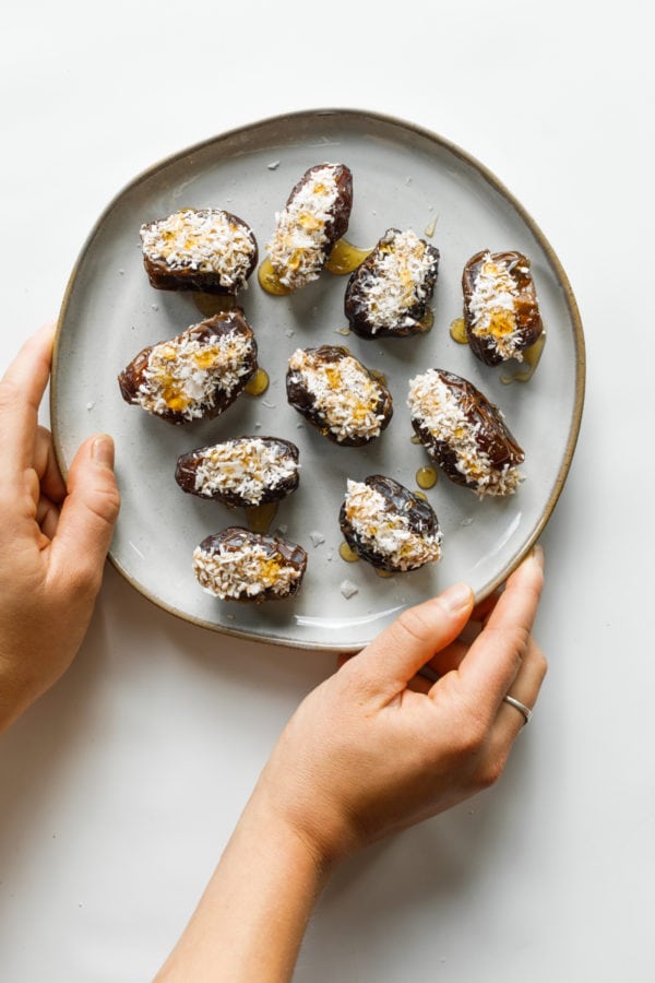 round plate of peanut butter dates