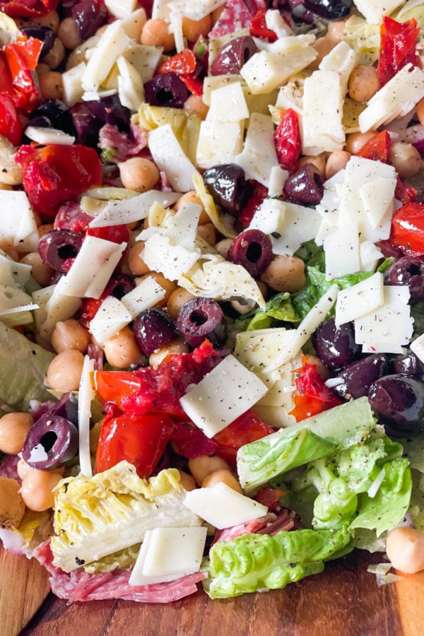 Italian chopped salad with olives, cheese, peppers