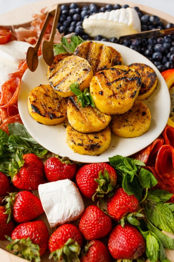 grilled polenta on a white round plate