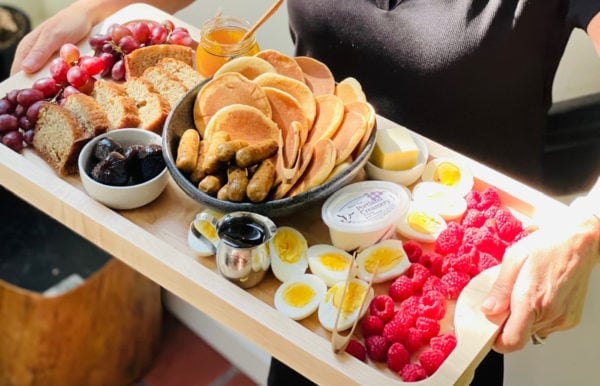 Greek Yogurt Banana Bread on a pancake board