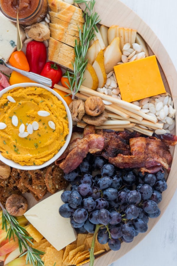 fall cheese board with hummus