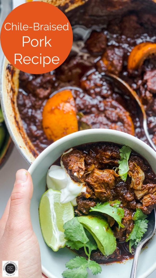 holding a bowl of Chile Braised Pork