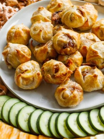 a bite of sausage and onion in puff pastry