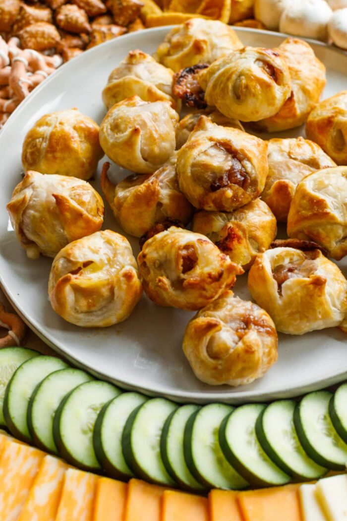 a bite of sausage and onion in puff pastry