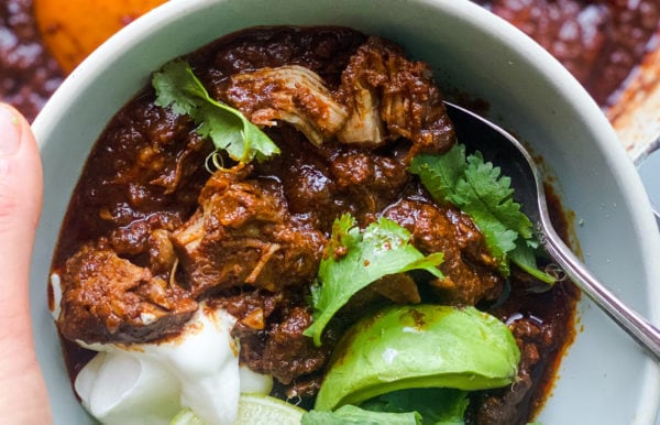 bowl of Chile Braised Pork with sour cream