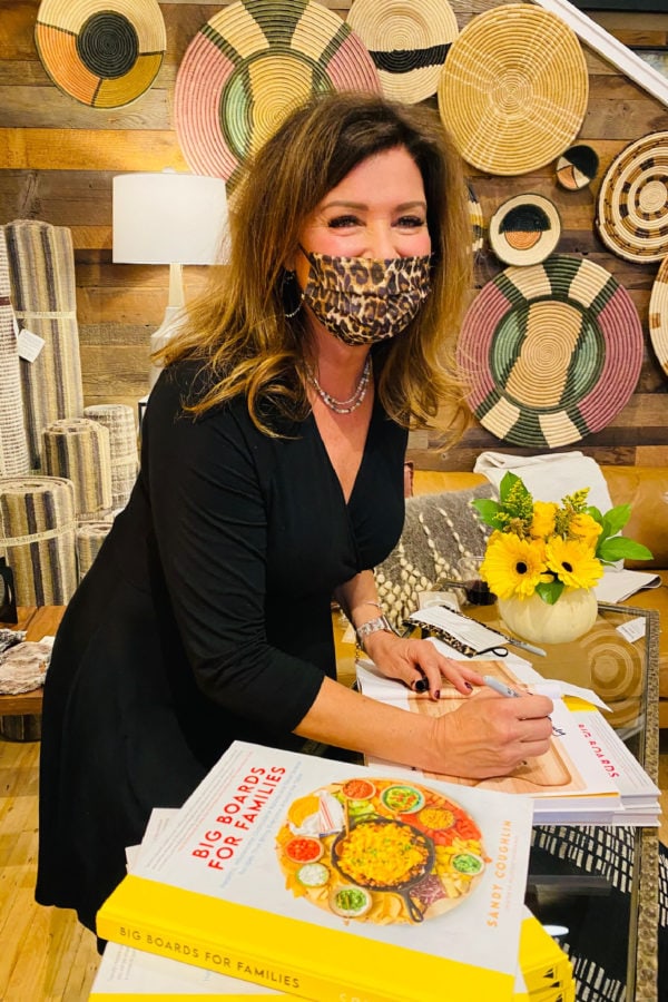 signing copies of cookbook