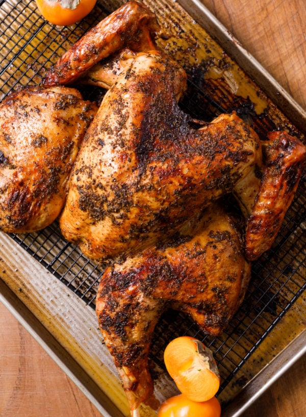 Orange Spiced Spatchcocked Turkey on baking sheet