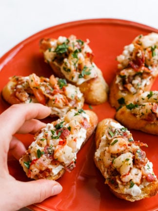 holding a Bacon Shrimp Toast