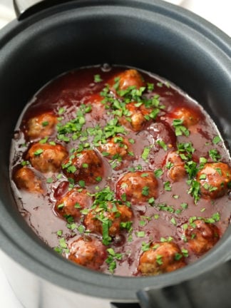 slow cooker of cocktail meatballs