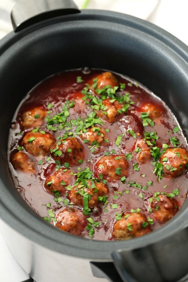 slow cooker of cocktail meatballs