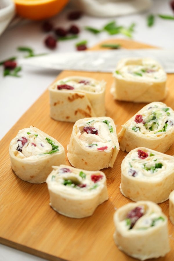 cutting Orange Cranberry Pinwheels Appetizer