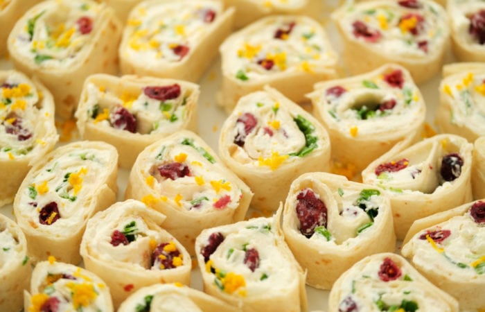 a plate of sliced Orange Cranberry Pinwheels Appetizer