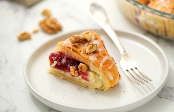 a serving with a fork of Raspberry Cream Cheese Crescent Ring
