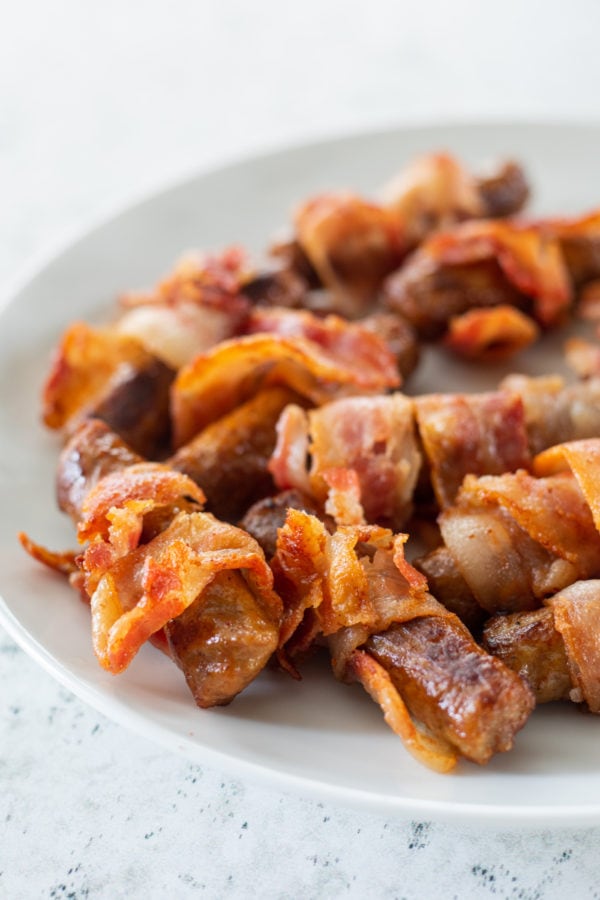 bacon rolled around sausage